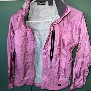 Reí raining jacket good condition from the out side but peeling from the inside